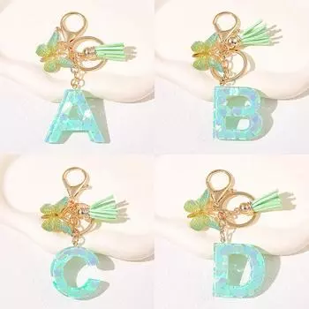 Модный зеленый брелок-бабочка с кисточками из 26 букв, брелок в форме сердца с пайетками и смолой, брелок с буквами алфавита для женщин, подвеска для сумки в машину A3