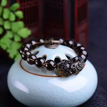 Модный желтый кристалл обсидиана хранит деньги и хранит зло obsidian