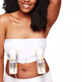 Молокоотсос Medela Breast Pumping White Освободите руки и сцеживайте грудь, одновременно используя или Идеально прилегает к телу Мягко поддерживает бюстгальтер Hands-Free, размер L. белый