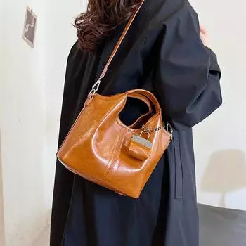 Мягкая кожаная сумка для женщин, большая вместимость, новая высококачественная и нишевая сумка через плечо на одно плечо