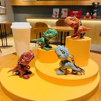 Мультфильм динозавр тираннозавр рекс кукла брелок динозавр рекс укус рука брелок школьный кулон серый