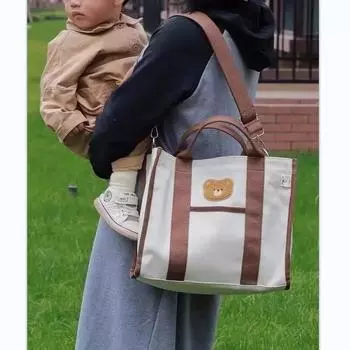 Mummy bag handbag slung one-shoulder hand bag embroidered mother bag portable large-capacity canvas tote bag.