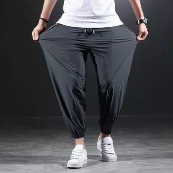 Мужские летние повседневные брюки большого размера из быстросохнущего ледяного шелка, эластичные свободные драпированные однотонные брюки на шнурке 8XL чёрный