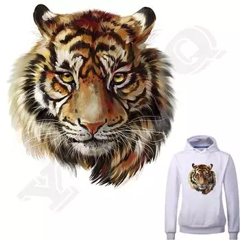 Заплатка в виде тигра. На клеевается с помощью утюгп