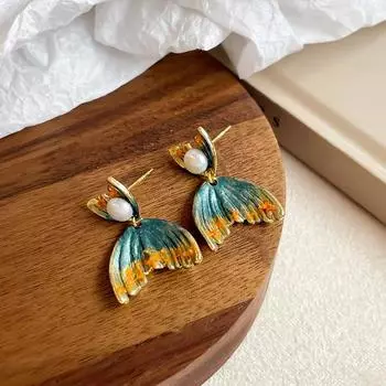 NALA Nala drip glaze fishtail freshwater pearl earrings light luxury senior sense of earrings niche senior sense of S925 silver needle NL09966E