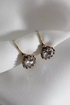 Настоящие серьги с овальными белыми камнями