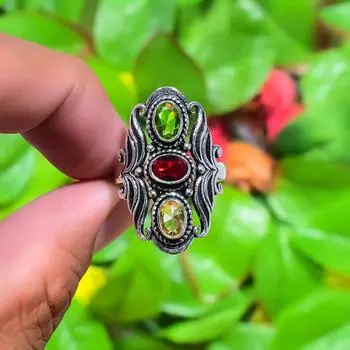 Кольцо из серебра 925 пробы с натуральным мозамбикским гранатом и цитрином S.11.5 D4t50