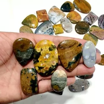 Натуральный кабошон из океанской яшмы. Партия кабошонов из океанской яшмы по весу, разных форм и размеров, используемых для изготовления ювелирных изделий. 100 Carat Ocean jas Lot