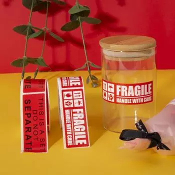 Не раздавливайте хрупкие наклейки. Этикетки в рулонах. Таблички. Предупреждение об обращении с светильником. Не ронять.