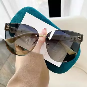 Нейлоновые поляризационные модные женские солнцезащитные очки без оправы в Интернете. Солнцезащитные очки знаменитостей.