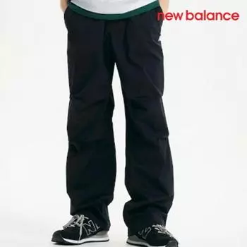 New Balance Брюки D24 Nbnte21023 19 Uni Essential Wide Parachute Fan FREE/L