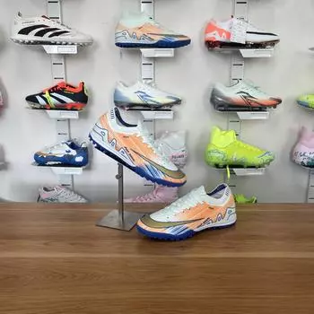 New low-top men s and women s football shoes with long nails and broken nails competition training shoes into artificial turf sports shoes 35