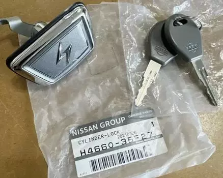 NEW OEM Nissan S13 Silvia Rear Trunk Lock Emblem Cylinder and Keys H4660-35F27