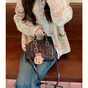 Niche bag women s 2024 new fashion pillow portable messenger bag high-end bowling Boston bag серебряный