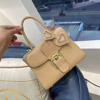 Niche design bag women s 2025 new trendy shoulder crossbody saddle bag fashionable horseshoe buckle del