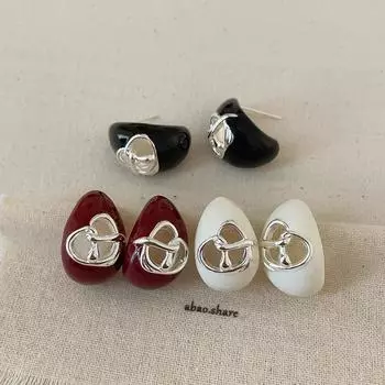 Niche Design Sense Alkaline Water Knot Dripping Oil Metal Stud Earrings Women S Light Luxury Texture Elegant Commuting Versatile Earrings