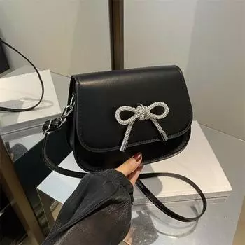 Niche French textured bag women s 2024 summer new bow small square bag personalized foreign style shoulder messenger bag чёрный