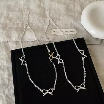 Нишевое золото и серебро контрастного цвета металлическое ожерелье с бантом женское простое высококачественное индивидуальное универсальное ожерелье на шею ключичная цепочка