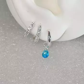 Niche high-end sense asymmetrical lake blue water drop zircon earrings women s simple and versatile fashion suit small earrings copper