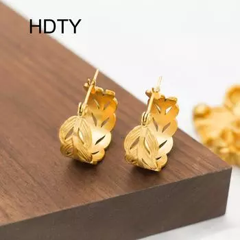 Niche light luxury titanium steel leaf ear buckle personalized creative design 18k gold temperament fashion earrings fashion золотой