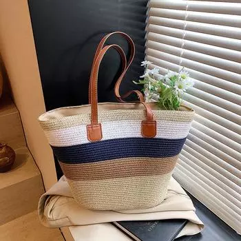 Niche striped woven big bag women s new commuter versatile straw woven tote bag seaside beach bag