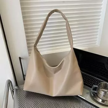 Нишевая дизайнерская сумка высокого класса с однотонным подмышечным ремешком 2024 года, повседневная сумка-тоут в ретро-стиле для женщин, текстурированная сумка через плечо в гонконгском стиле белый