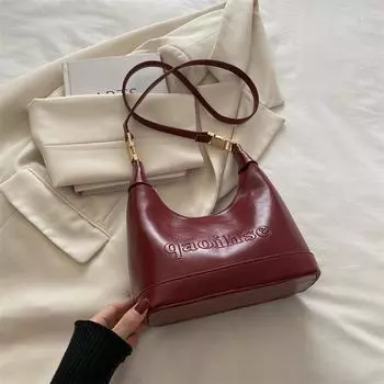 Нишевая сумка Женская мода и популярная высококачественная сумка через плечо Сумка-сумка через плечо Сумка-пельмень красный