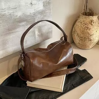 Нишевые женские сумки, высококачественные сумки подмышками 2024 новые простые сумки-подушки, универсальные сумки-мессенджеры через плечо