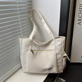 Новая холщовая сумка 2024 года для женщин, простая корейская версия повседневной сумки большой вместимости для поездок на работу и обратно для студентов и студентов чёрный