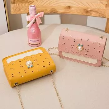Новая маленькая девочка 2024 новая модная корейская версия универсальная одно плечо кроссбоди для девочек полая шикарная цепная сумка жёлтый