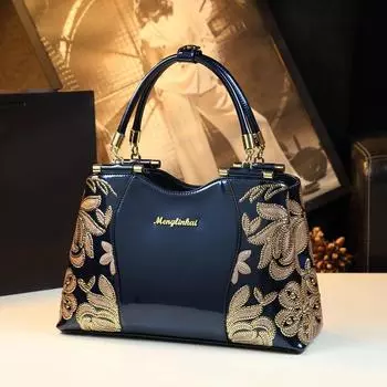 Новая модная вышитая сумочка бордовый