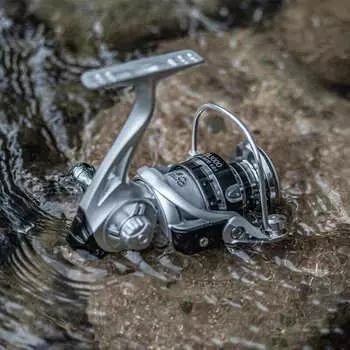 Новая спиннинговая рыболовная катушка Ultralight Максимальное сопротивление 10 кг 5.2:1 Высокоскоростной латунный шпиндельный металлический коромысло, применимый к нескольким морским районам FG-2000