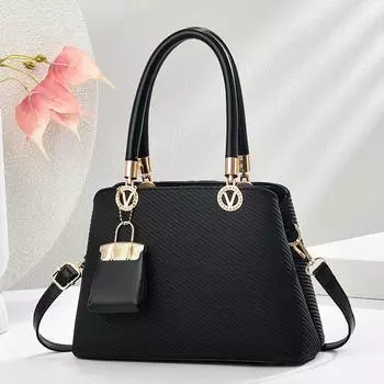 Новая сумка Macaron Splicing Handbag Высокий уровень внешнего вида Простая атмосфера сумка через плечо с большой вместимостью Сумка через плечо .