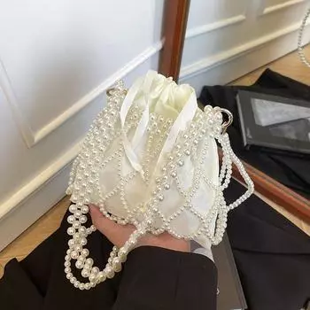 Новое лето новая плетеная сумка из жемчуга маленькая свежая литературная девушка универсальная модная ажурная пляжная сумка one size fits all белый