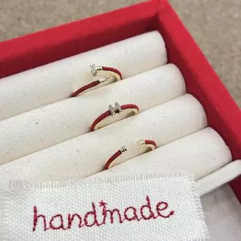 Новогоднее кольцо с красной веревкой, регулируемое - китайский стиль, простой и универсальный оригинальный дизайн Red Rope Series Simple Double-Headed