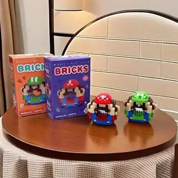 Новые братья Марио. пончик модель строительные блоки детский мультфильм выгода интеллект сборка игрушечные фигурки можно оптом Tape box
