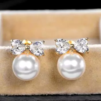 Новые серьги с искусственным жемчугом в форме банта для женщин, элегантные серьги-пусеты золотого цвета для пирсинга ушей, вечерние необычные подарочные аксессуары