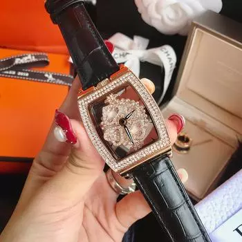 Новые женские часы в стиле бочонка с полым прозрачным вращающимся циферблатом и стразами