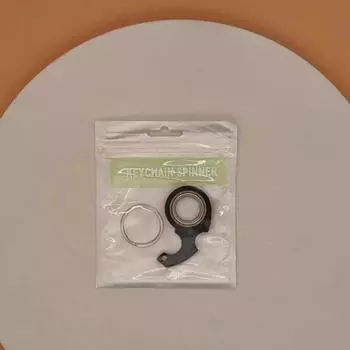Новый изысканный брелок для ключей с декомпрессией, вращающийся на кончике пальца, игрушка для снятия беспокойства, вращающийся на кончике пальца, подарок для пары чёрный