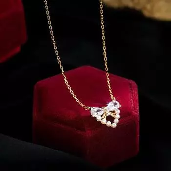 Новый летний стиль для женщин, легкое роскошное нишевое жемчужное ожерелье с бантом