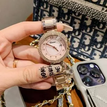Новый стиль горный хрусталь мода темперамент легкие роскошные кварцевые часы простые пригородные женские часы со стальным ремешком с календарем