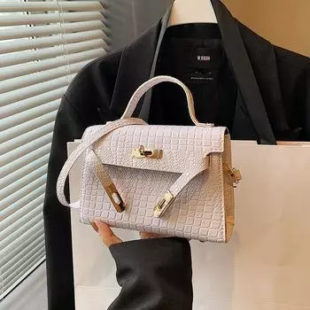 Новый узор из камня, однотонный цвет 2024 года, летнее ощущение осени, индивидуальный дизайн в иностранном стиле, женская сумка через плечо, портативная, маленькая квадратная сумка темно-коричневого