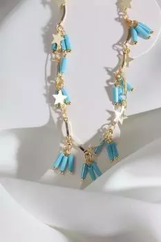 Ножной браслет с свисающей золотой цепочкой из синей бусины и звездой