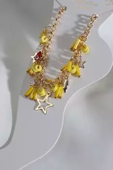 Ножной браслет золотого цвета с желтой бусиной