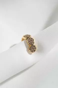 Одиночная серьга из сжатого хряща круглой формы с камнем золотого цвета