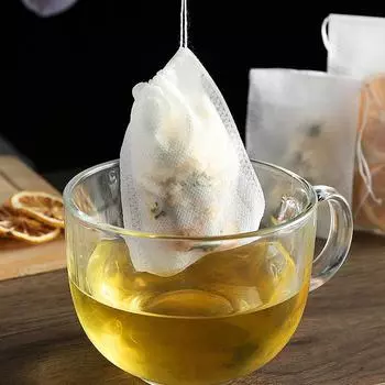 Одноразовый нетканый фильтр-мешок для отваривания с всасывающим шнуром, защищающим от грязи, пакетик для отваривания порошка с традиционной китайской медициной, чайный пакетик 5 * 7 type белый