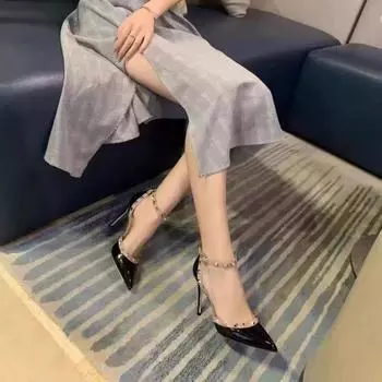 One-word buckle with bag head sandals 2025 new temperament with skirt sexy rivets high heels women s thin heel pointed 34