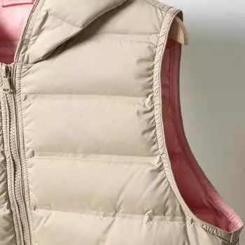 Осень и зима новый легкий пуховик жилет женский короткий с капюшоном бесшовный прессованный клеевой терможилет модные контрастные цвета M чёрный