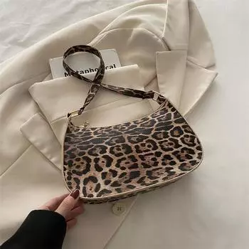 Осенью популярны сумки нишевого дизайна, модные сумки на одно плечо и подмышку, женские сумки с леопардовым принтом. коричневый