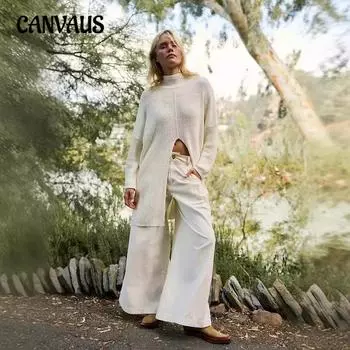 Осенне-зимний женский однотонный уличный модный свитер средней длины с разрезом S чёрный